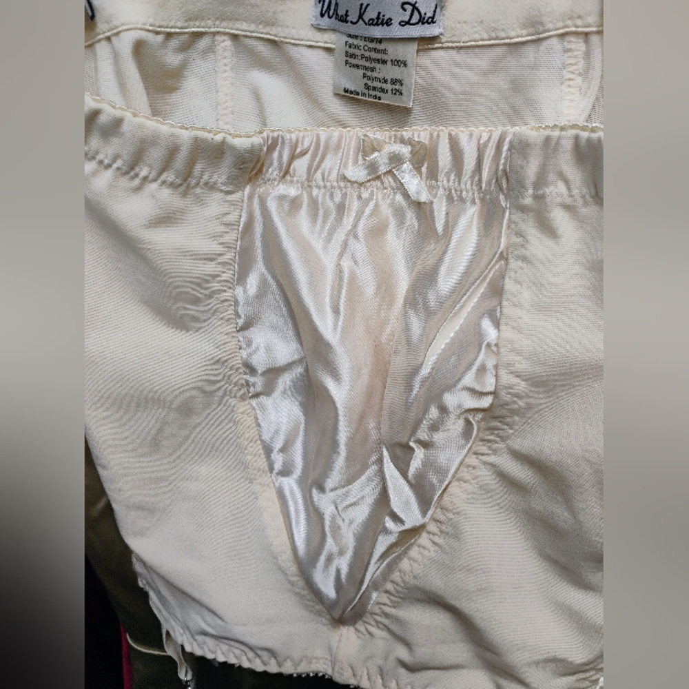 Elegant Cream Women's Intimate Wear girdle with garter straps.